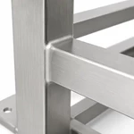 Close-up of a welded horizontal support rail on a brushed aluminum cabinet frame