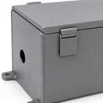 Close-up of flush latch clip and smooth corner weld seam on matte gray metal junction box