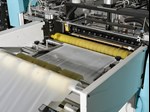 Cutting-Inserting-Sewing-Hemming Machine